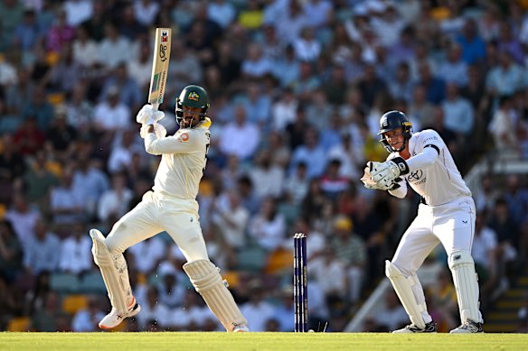 Mitch Starc cuts on his way to 77.