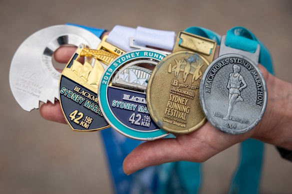 Kartsounis’ collection of medals from racing in the Sydney Marathon. 