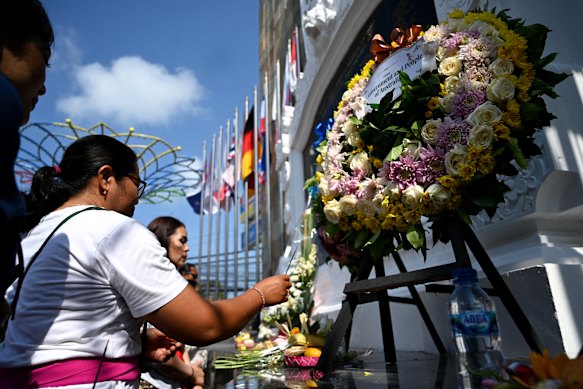 Balinese woman pray at the monument of the 2002 Bali bombings during a memorial service to mark the 22th anniversary in Kuta near Denpasar, Bali on October 12, 2024.