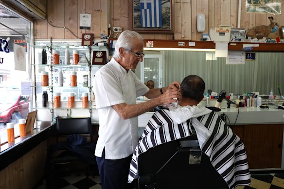 Barber Steve Kulumundris, owner of the Steve and Angela Unisex Salon for 40 years on Burwood Rd, Belmore. 