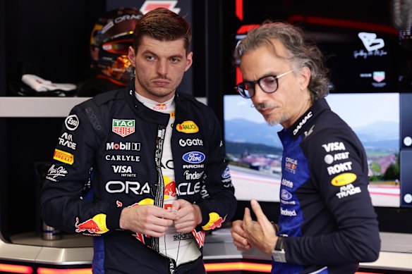 Max Verstappen (right) with Red Bull team principal Laurent Mekies.