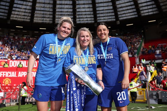 Emma Hayes with Sam Kerr (right) and Millie Bright after Chelsea won the Women’s Super League trophy. 