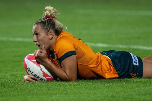 Teagan Levi scores a try for Australia.