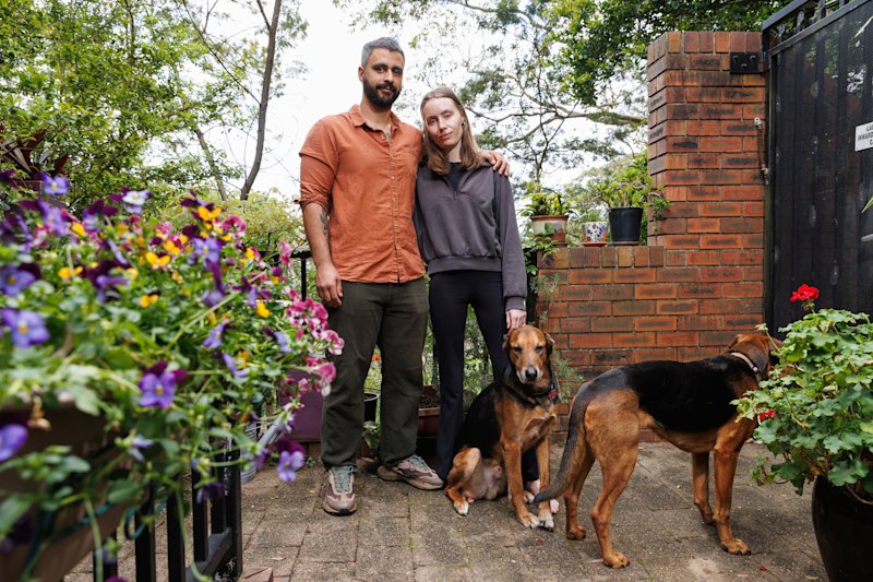 Gonzalo Voena Nicolas and Steph Tsindos with their dogs Pink and Floyd.