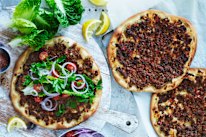 Crisp-edged, whisper-thin dough topped with a spiced layer of minced meat.