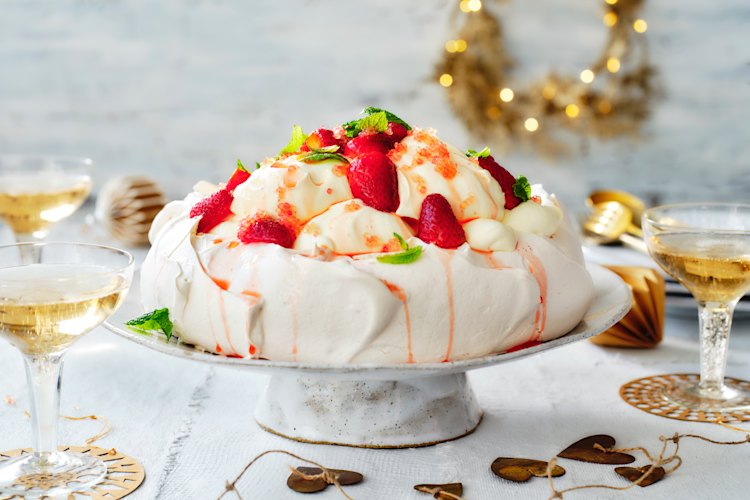 This pavlova is creamy, merry and bright, thanks to pops of finger lime.