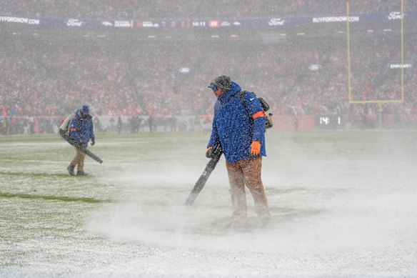 The grounds crew was kept busy during the AFC Championship game.