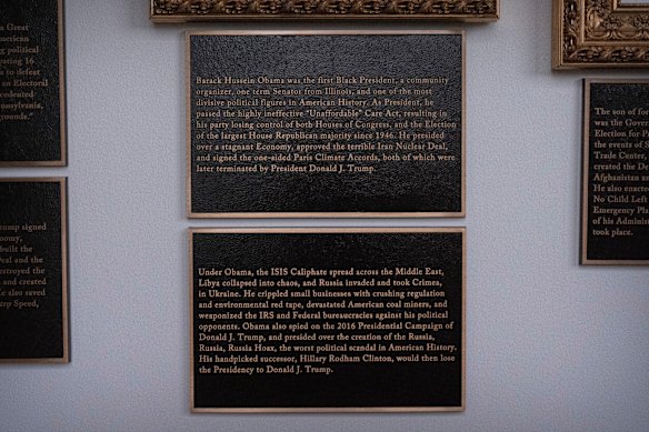 The plaques below Obama’s portrait.