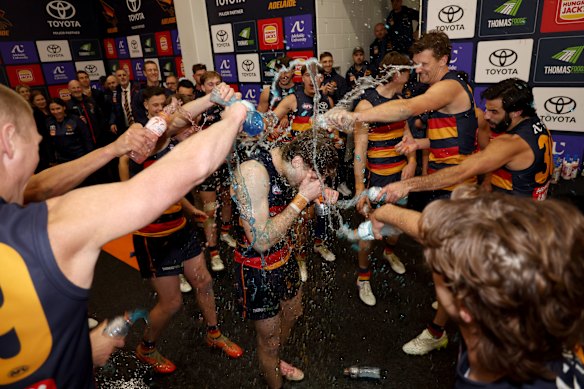 Hugo Hall-Kahan copped the Gatorade shower in the Adelaide rooms after his first game.