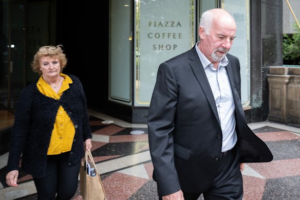 Former Leighton Holdings executive David Savage and his wife, Jenny, outside the Downing Centre District Court in 2023.