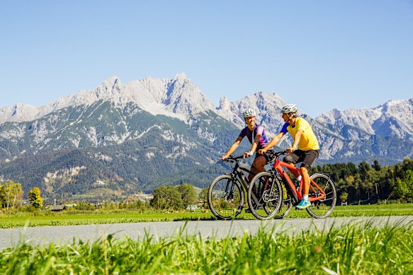 The route is full of European cyclists, some riding regular bikes and others some atop e-bikes.