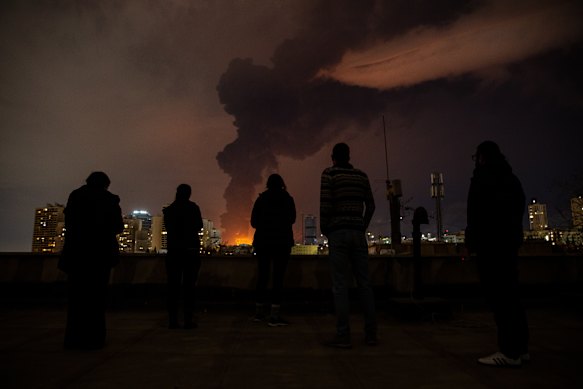 Smoke billows from oil refineries in Tehran after Israeli air strikes on March 7.