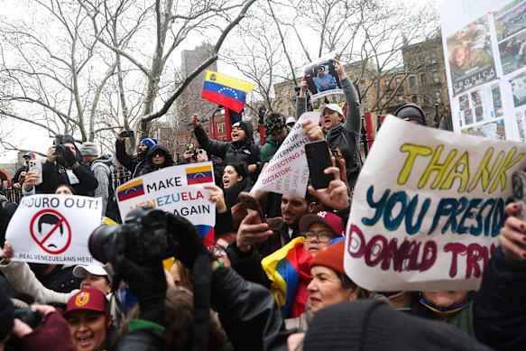 People protest outside Manhattan Federal Court on Monday.