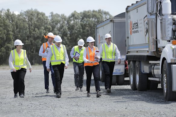 Then transport minister Mark Bailey (second from left) and public works minister Mick de Brenni (far right) with other cabinet members and premier Annastacia Palaszczuk on the 2020 election campaign trail.