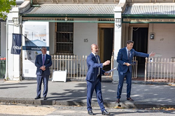 A developer bought two former Homes Victoria Carlton terraces for $1,705,000 at Saturday’s auction. 