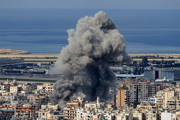 Smoke billows after an Israeli air strike on an alleged pro-Iranian Hezbollah target in southern Beirut as Israel continued its attacks on Lebanon. 
