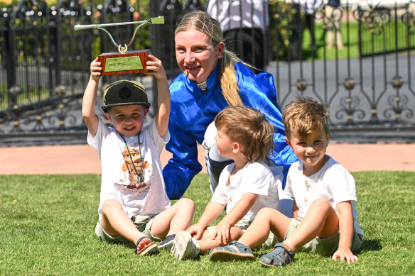Kah in March this year with three of the late Dean Holland’s four children after winning the Newmarket Handicap, the race she missed after her serious fall at the same meeting last year.