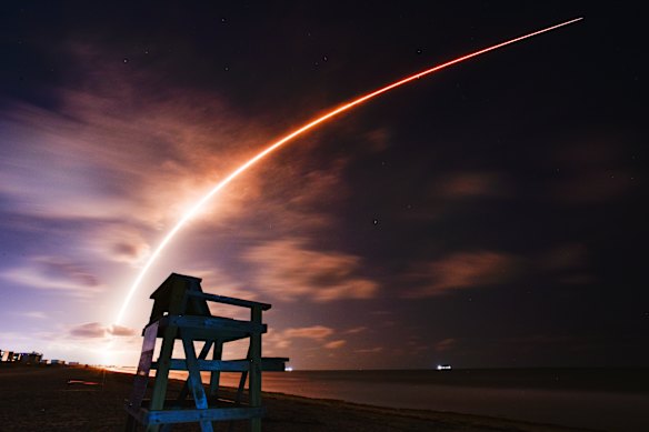 A SpaceX Falcon 9 rocket carrying a batch of Starlink satellites launches from Cape Canaveral, Florida.