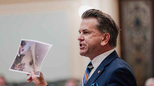 Deputy Premier Jarrod Bleijie tables photos purporting to show former premier Steven Miles drinking red wine at Townsville Airport.