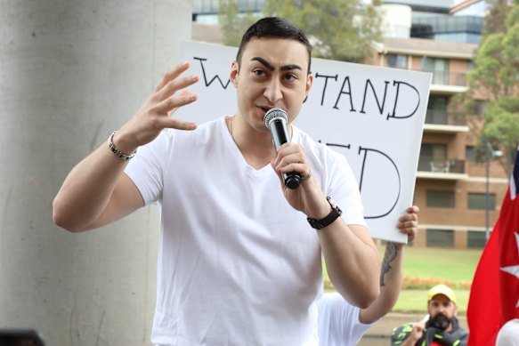 Jammal  protests against vaccine mandates in 2021.
