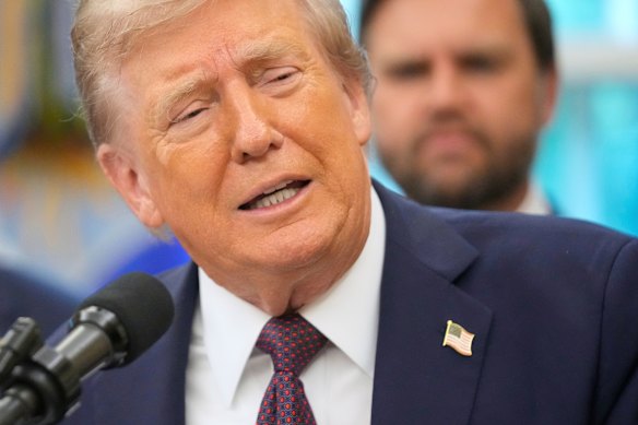 US President Donald Trump addresses the media at the White House overnight.