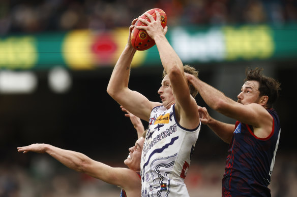 Josh Treacy takes a mark.