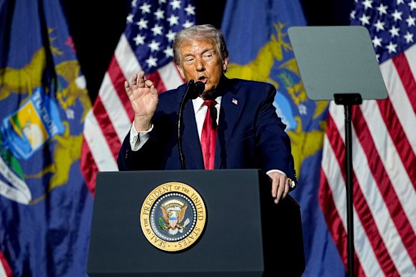 US President Donald Trump addresses the Detroit Economic Club on Tuesday (Wednesday AEDT).