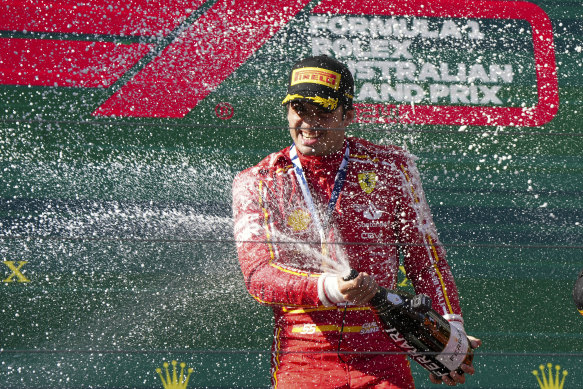 Ferrari’s Carlos Sainz celebrates his win in the Australian Grand Prix.