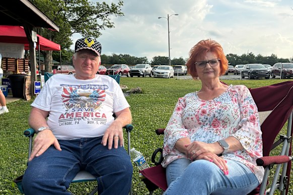 Sharon Karlheim, with her husband, Regis, says Trump is doing a great job, but there is a lot more to do.