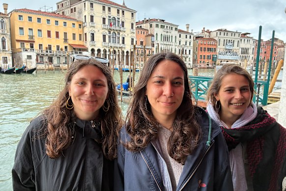 Federica Toninello (centre) with friends at a meeting of Assemblea Sociale per la Casa, which searches for derelict houses to renovate and live in. 