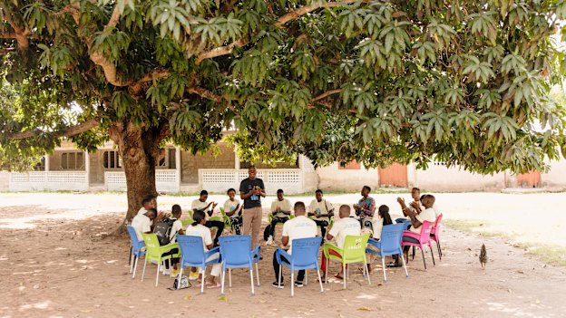  Jerry and members of the Ghana Survivor Network, a community of advocates against child trafficking united by shared suffering.