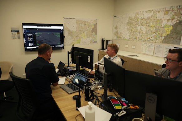Officers at Werribee police station watch the footage from the air wing in real time.