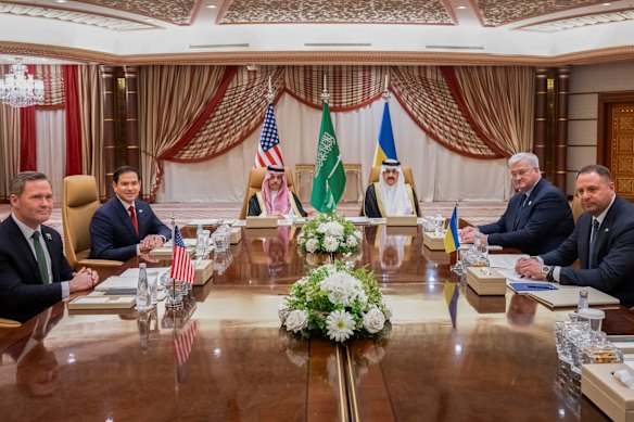 Yermak (pictured far right) has been a key representative in talks with the US on ending the war in Ukraine.