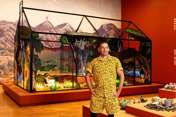 Tony Albert, artistic director of the 5th National Indigenous Art Triennial in front of House of Namatjira.