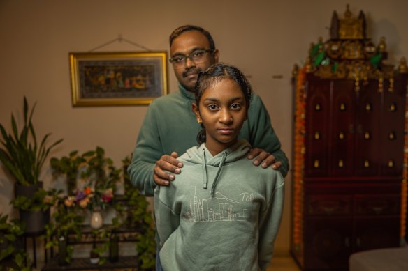 Eleven-year-old student Prisha Kumar with her father Vijay Kumar. Prisha had her selective school test postponed in May.