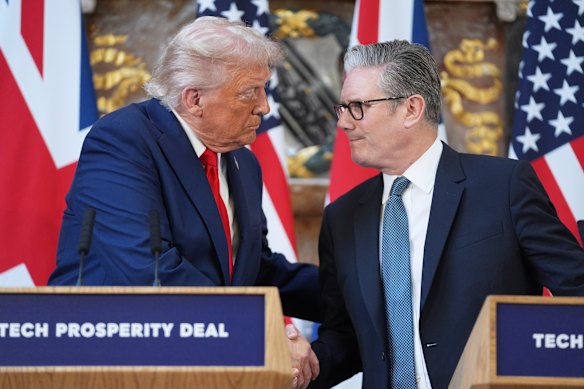 Donald Trump shakes Keir Starmer’s hand during a joint appearance at Chequers.