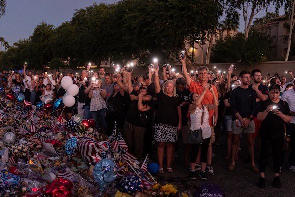 A vigil for Charlie Kirk the night before the memorial.