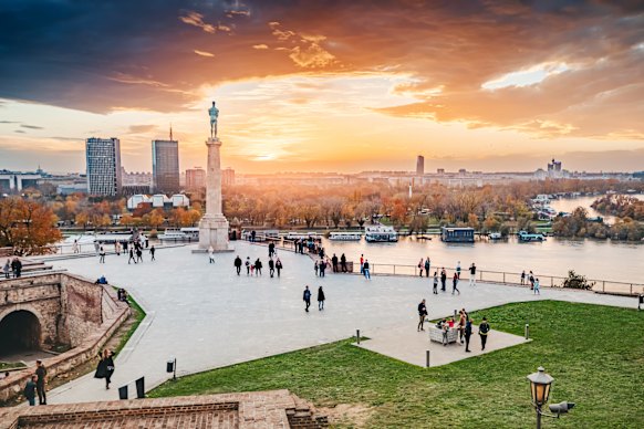 The sun sets over Belgrade’s main public park overlooking the confluence of the Serbian capital’s two great rivers.