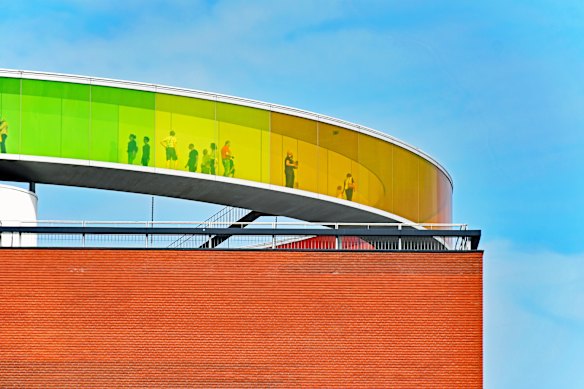 Visitors to Aarhus’s ARoS Art Museum enjoy views of the Danish city.