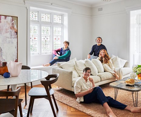 The living room is where Tash Sefton, Adam Genovese and Sefton’s sons Jay (in the bay window) and Mac like to hang out. The large artwork, Feelings Like This, is by Antonia Perricone.