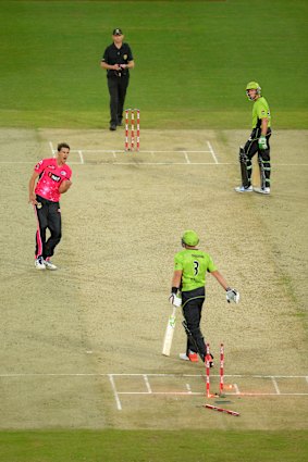 Jacques Kallis is bowled by Mitch Starc in the BBL in 2014. Mike Hussey looks on from the other end. 