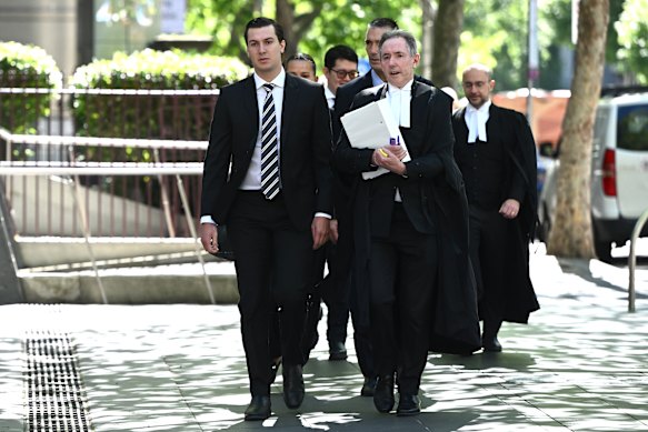 Tom Silvagni (left) arrives at the County Court of Victoria in November.