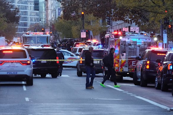 Emergency vehicles respond to a shooting of two National Guard troops near the White House in November.