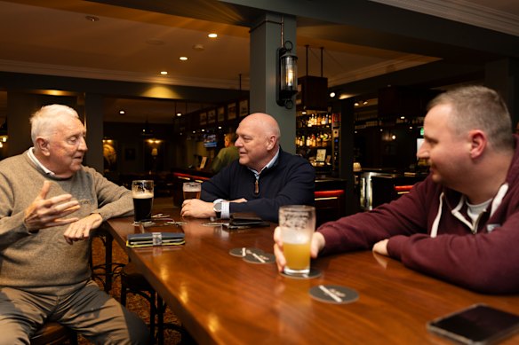 Drinkers at the Plough & Harrow pub on Argyle Street, Camden.
