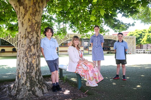 St Bernard’s School principal Julie Di Noto with students Hugo Stacey, Rose Boardman and JJ Pisani. 