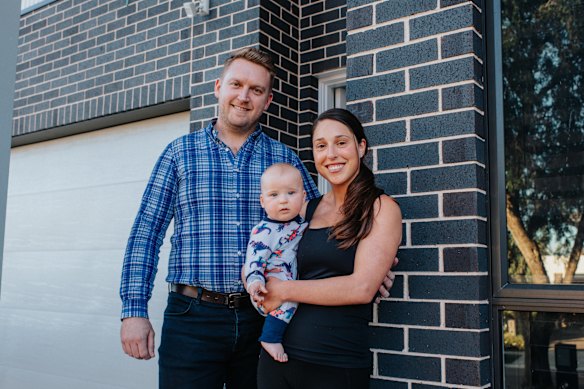 Jeremy and Suzy Whiting with their son George at their home in Ryde. 