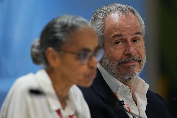 Brazil’s Environment Minister, Marina Silva, left, speaks as COP30 president André Corrêa do Lago listens at a news conference at the COP30.
