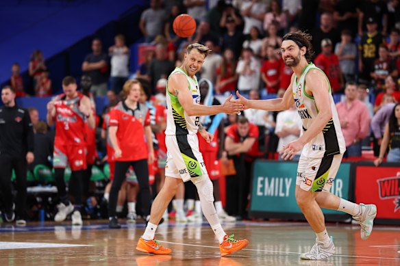 Nathan Sobey and Jordan Hunter celebrate a Phoenix win over the Wildcats.