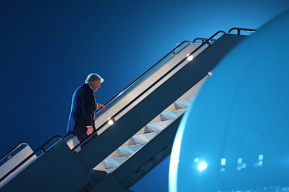 US President Donald Trump boards Air Force One at Sharm El-Sheikh International Airport in Egypt to return to the US on Monday.