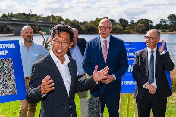 Howard Ong speaks at the press conference announcing the upgrade to Shelley Bridge as Dutton watches on.